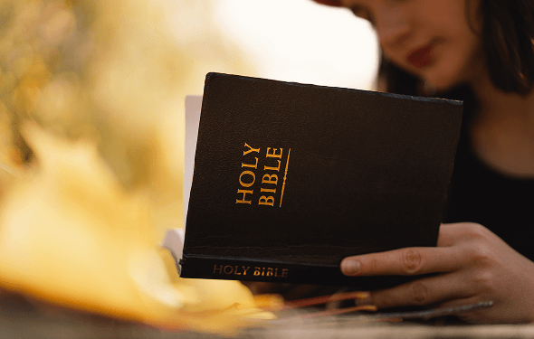 christian teen girl holds bible in her hands read 2025 03 08 18 49 16 utc 1